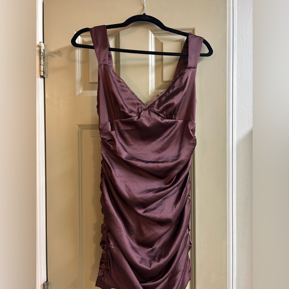 Brown ruched dress with lace details.